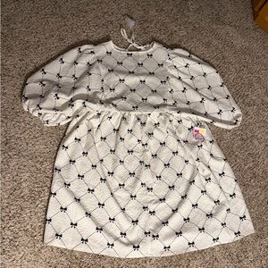 White Dress with Black Bow Pattern
